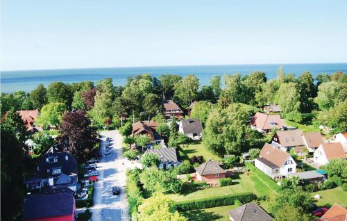 arial view of a residential neighborhood with houses and trees at 1 Bedroom Amazing Apartment In Hohwacht in Hohwacht