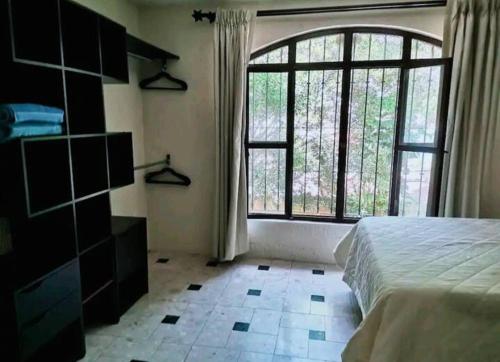Una cama o camas en una habitación de CasonaPalmira