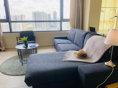 Un lugar para sentarse en Cozy Tamarind Suites