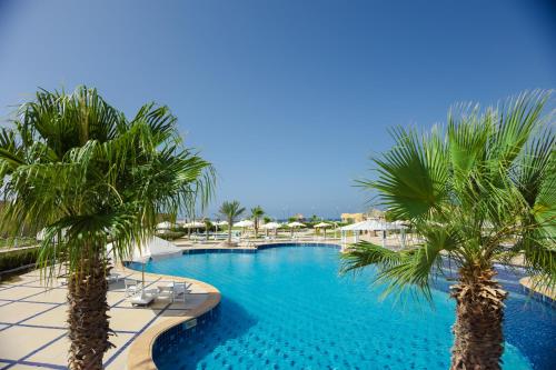 Bazén v ubytování Grand Waha Resort nebo v jeho okolí