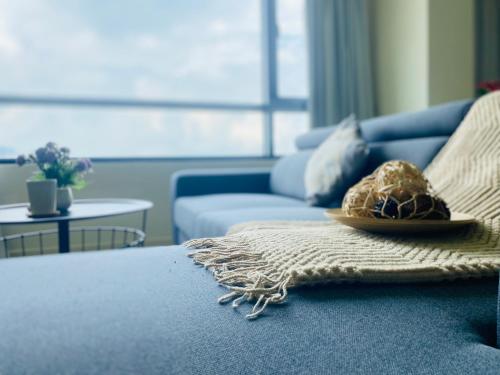 Un lugar para sentarse en Cozy Tamarind Suites