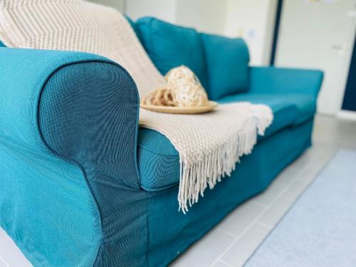 Un lugar para sentarse en Cozy Tamarind Suites