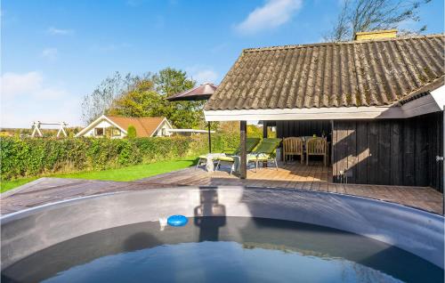 a swimming pool in the backyard of a house at Holiday Home Teglbakken Egernsund I in Egernsund