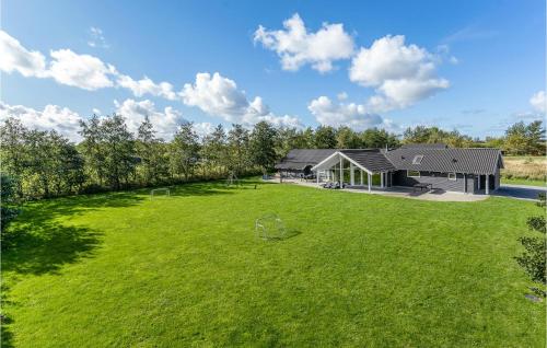 an aerial view of a house with a large yard at Beautiful Home In Idestrup With Sauna in Bøtø By