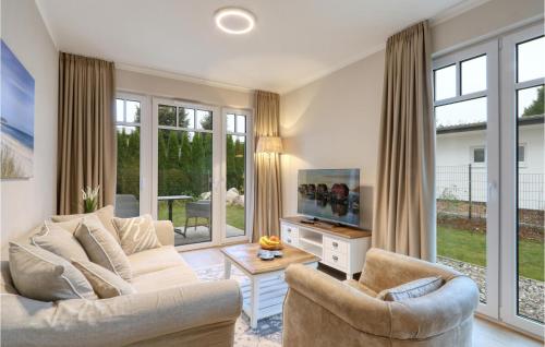 TV a/nebo společenská místnost v ubytování Baltischer Hof Apartment 8