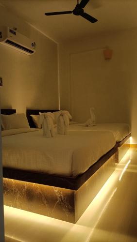 Katil atau katil-katil dalam bilik di La Shashalia Luxury
