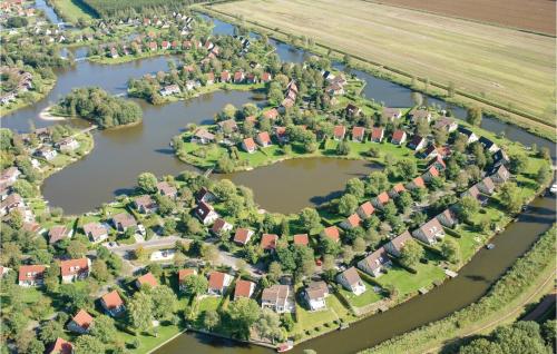 an aerial view of a small village in a river at Cozy Home In Vlagtwedde With Sauna in Vlagtwedde