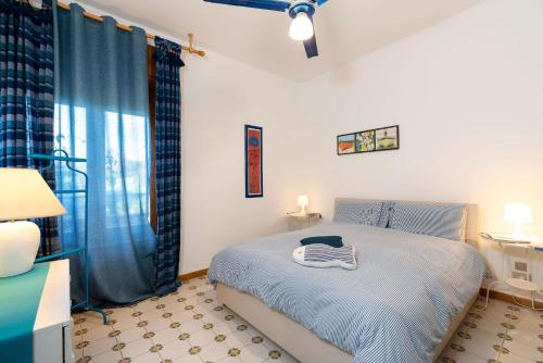 Postel nebo postele na pokoji v ubytování Casa Busà