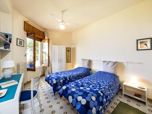 Postel nebo postele na pokoji v ubytování Casa Busà