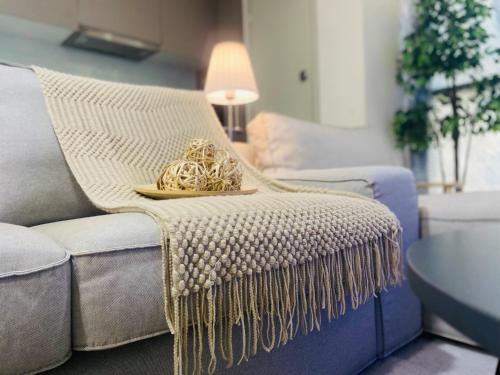 Un lugar para sentarse en Cozy Tamarind Suites