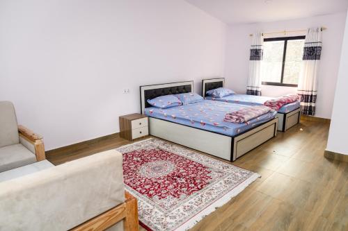 Postel nebo postele na pokoji v ubytování Pari Ghar
