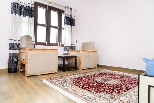Posezení v ubytování Pari Ghar