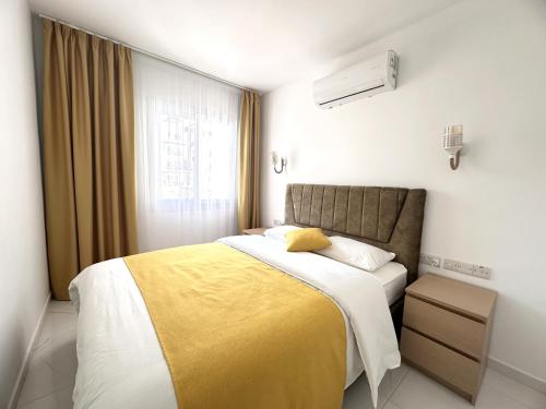 Postel nebo postele na pokoji v ubytování Apartment in Thalassa Beach Resort & Spa Retreat