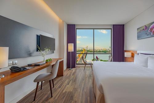 Postel nebo postele na pokoji v ubytování Vanda Hotel
