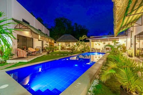 an image of a swimming pool in a house at Panglao Lofts in Panglao