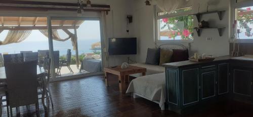 TV a/nebo společenská místnost v ubytování Casa di Mare Stegna