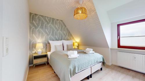 Ένα ή περισσότερα κρεβάτια σε δωμάτιο στο Rüm hart