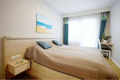 Ένα ή περισσότερα κρεβάτια σε δωμάτιο στο Apartament Silence z Tarasem Parterowy