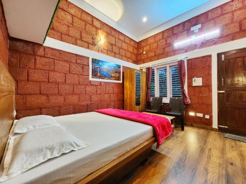 Katil atau katil-katil dalam bilik di Evergreen County Retreat-India's First Adventure Veg Retreat