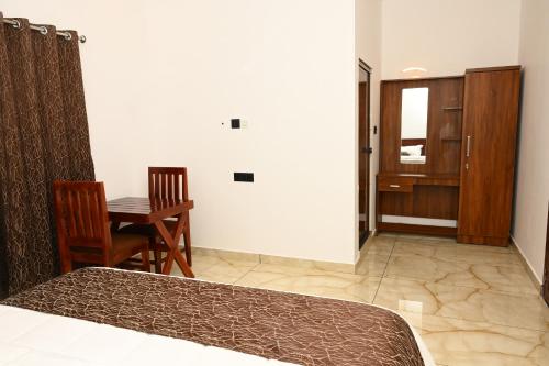 Una cama o camas en una habitación de Elettaria Valley