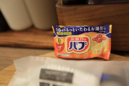 a bag of food sitting on a table next to a scale at Green Inn Kaohsiung in Kaohsiung
