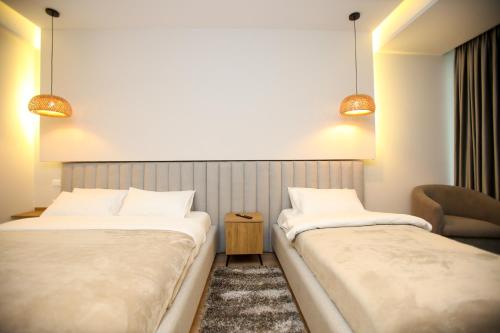 Hotel Vlora Internationalにあるベッド