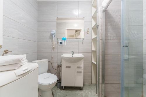 Kúpeľňa v ubytovaní Sienkiewicza Blue Apartment