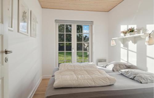 Postel nebo postele na pokoji v ubytování Awesome Apartment In Nykøbing Sj