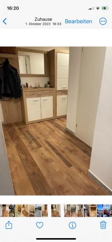 a picture of a kitchen with a wooden floor at Haus Leona in Teufenbach