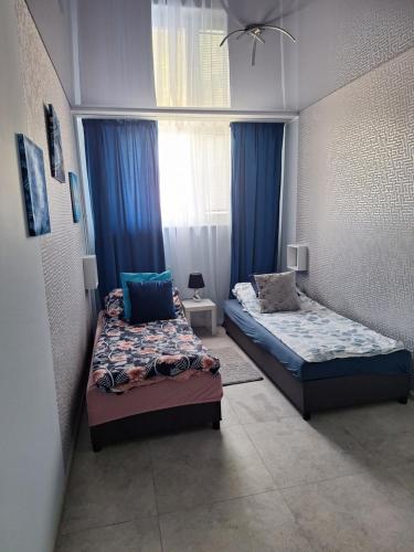 Ένα ή περισσότερα κρεβάτια σε δωμάτιο στο Marina Gorzów