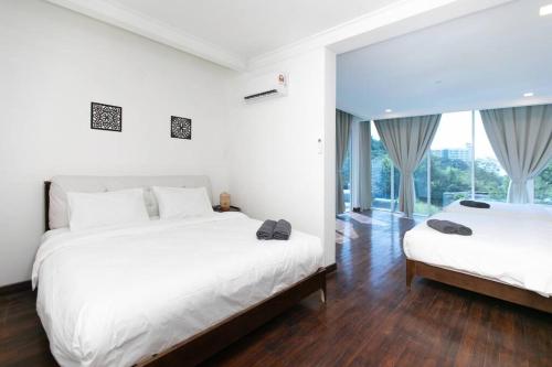 Ένα ή περισσότερα κρεβάτια σε δωμάτιο στο Tanjung Bungah 5BR Villa w pool 20pax
