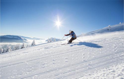a person is skiing down a snow covered slope at Isolina in Valsavarenche