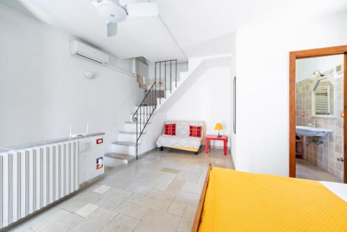 Postel nebo postele na pokoji v ubytování Casa Colombo & Casa Scipione by Rentbeat