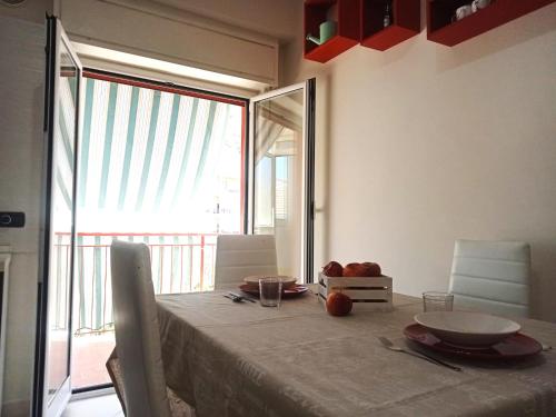 a dining room table with a table cloth on it at La Tortora in Cefalù