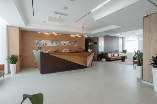 Лобби или стойка регистрации в Qazaq Hotel Premium