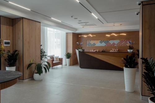 Лобби или стойка регистрации в Qazaq Hotel Premium