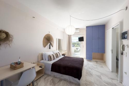 โทรทัศน์และ/หรือระบบความบันเทิงของ Karystos Mare Apartments