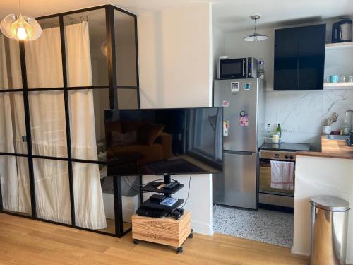 Photo de la galerie de l'établissement Quiétude au Village Jourdain, à Paris