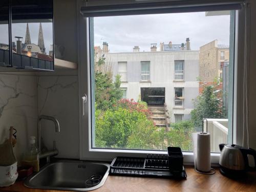 Photo de la galerie de l'établissement Quiétude au Village Jourdain, à Paris