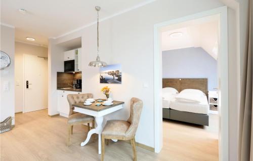 Postel nebo postele na pokoji v ubytování Baltischer Hof Apartment 58