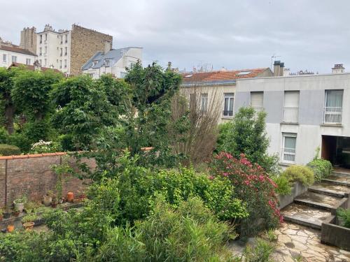 Photo de la galerie de l'établissement Quiétude au Village Jourdain, à Paris
