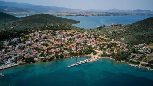 an aerial view of a small island in the water at Effie's Maisonette with Detached Studio in Amaliápoli