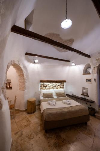 Trullo Nobilisにあるベッド