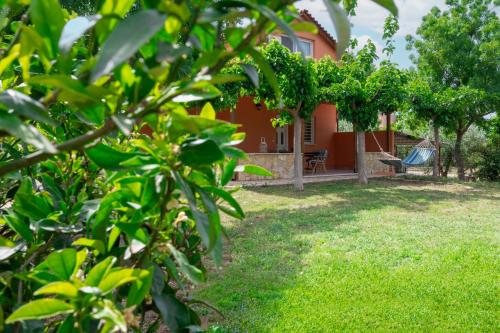 a view of a house from the garden at Agrotospita Country Houses in Nafplio