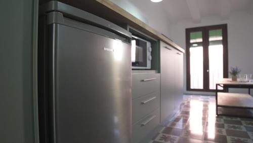 Una cocina o cocineta en FORUM EXPERIENCE Adults Only
