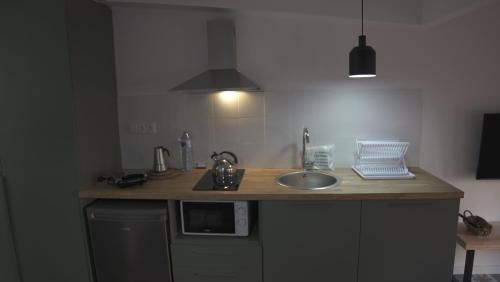 Una cocina o cocineta en FORUM EXPERIENCE Adults Only