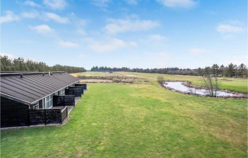 an overhead view of a building on a golf course at Cozy Home In Pandrup With Wifi in Pandrup