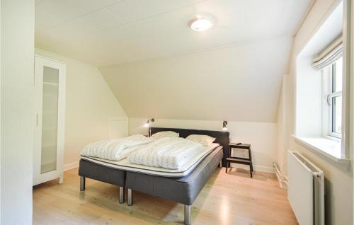 a bedroom with a bed in a room at Holiday Home Gredstedbro 2 in Gredstedbro