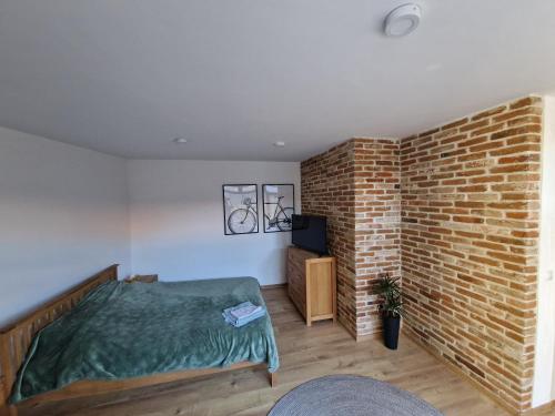 Postel nebo postele na pokoji v ubytování GIRO Guest House