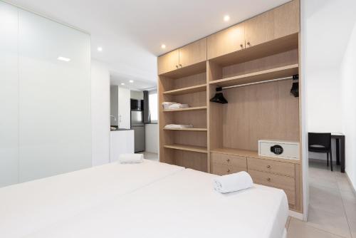 Postel nebo postele na pokoji v ubytování Rentalmar Aries Plus